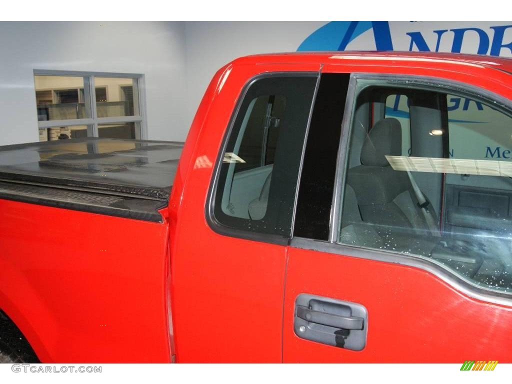 2004 F150 XLT Regular Cab 4x4 - Bright Red / Dark Flint photo #16