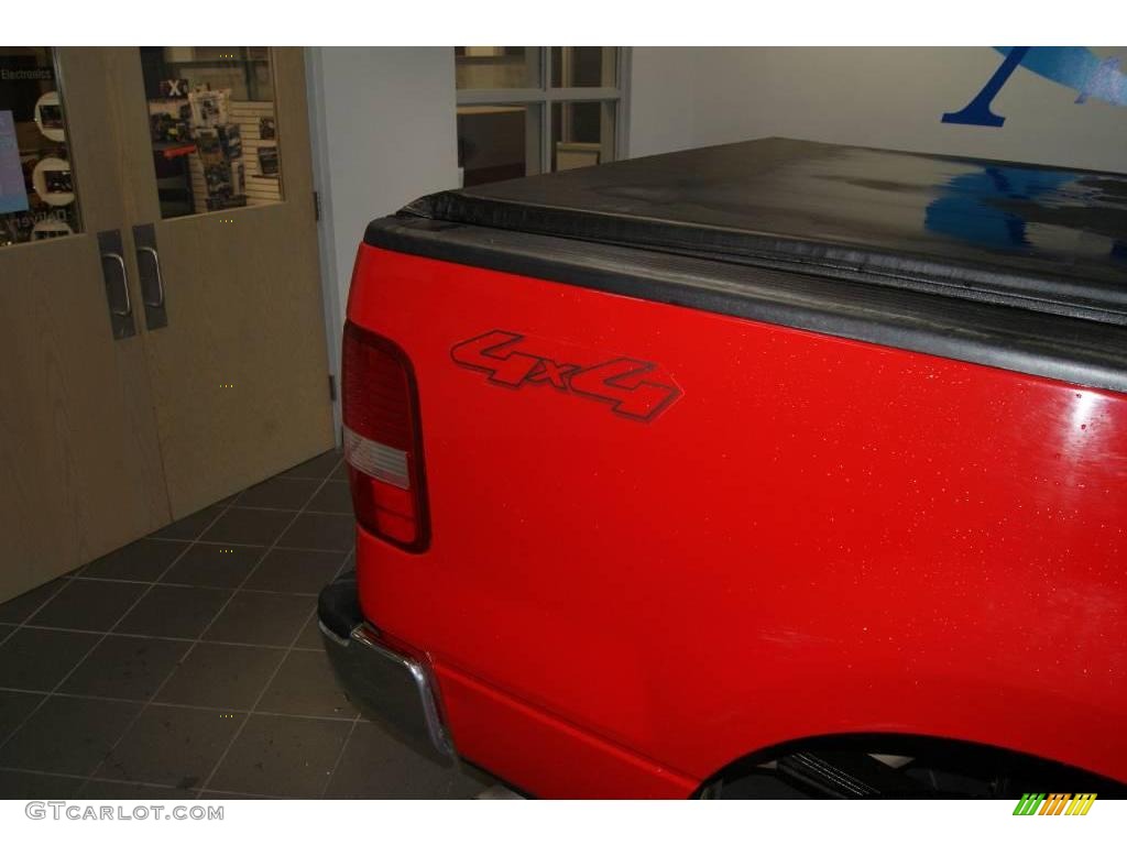 2004 F150 XLT Regular Cab 4x4 - Bright Red / Dark Flint photo #19