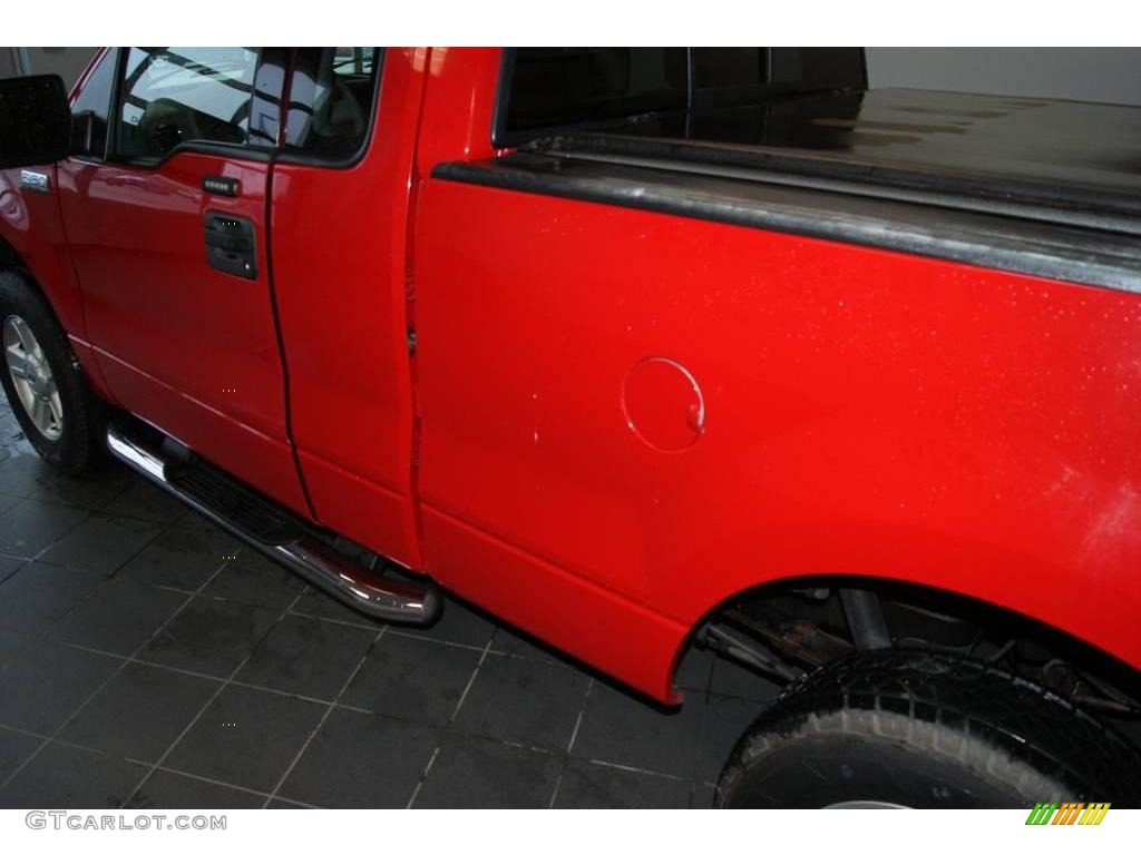 2004 F150 XLT Regular Cab 4x4 - Bright Red / Dark Flint photo #23