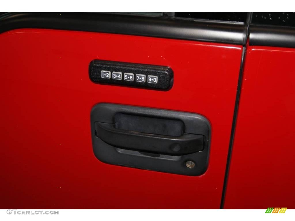 2004 F150 XLT Regular Cab 4x4 - Bright Red / Dark Flint photo #24