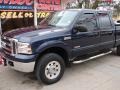 2005 True Blue Metallic Ford F250 Super Duty XLT Crew Cab 4x4  photo #3