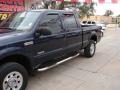 2005 True Blue Metallic Ford F250 Super Duty XLT Crew Cab 4x4  photo #9