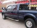 2005 True Blue Metallic Ford F250 Super Duty XLT Crew Cab 4x4  photo #20