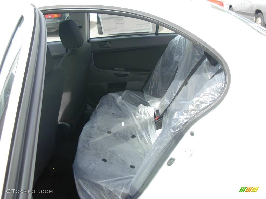 2010 Lancer DE - Wicked White Metallic / Black photo #3