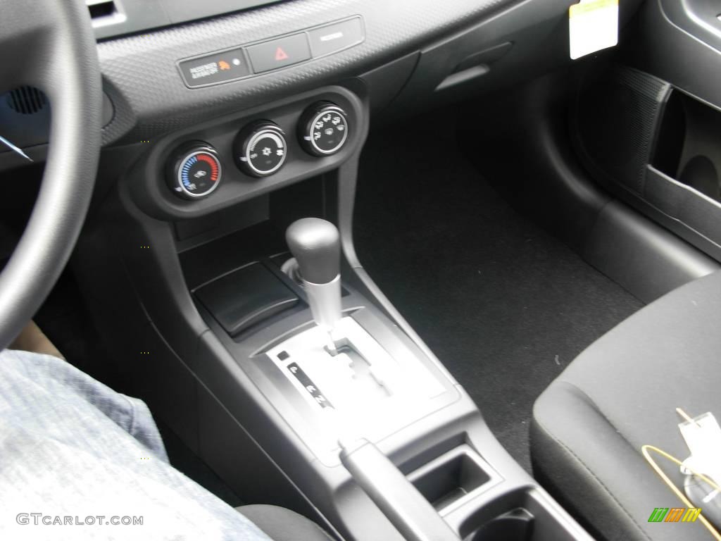 2010 Lancer DE - Wicked White Metallic / Black photo #23
