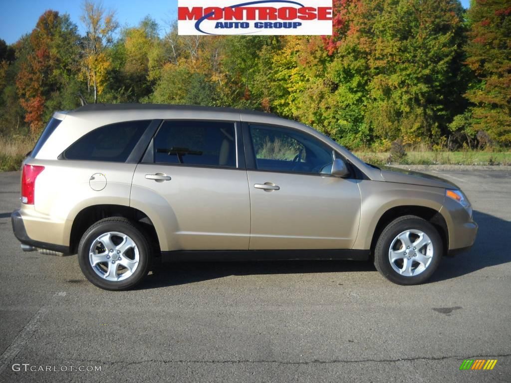 2007 XL7 Luxury AWD - Prairie Gold Metallic / Beige photo #1