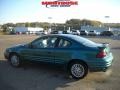 1999 Medium Green Blue Metallic Pontiac Grand Am SE Coupe  photo #6