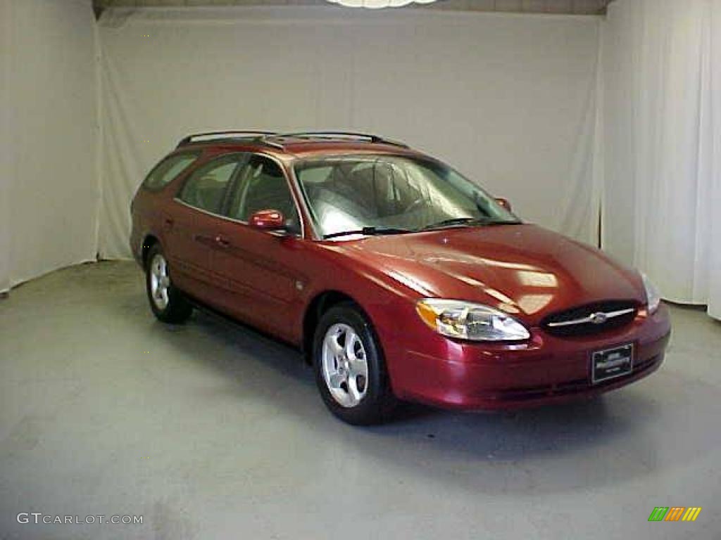 2000 Taurus SE Wagon - Toreador Red Metallic / Medium Graphite photo #1