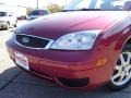 2005 Sangria Red Metallic Ford Focus ZX4 SE Sedan  photo #9