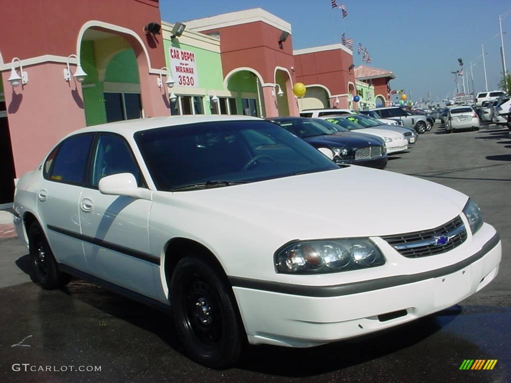 2003 Impala  - White / Regal Blue photo #1