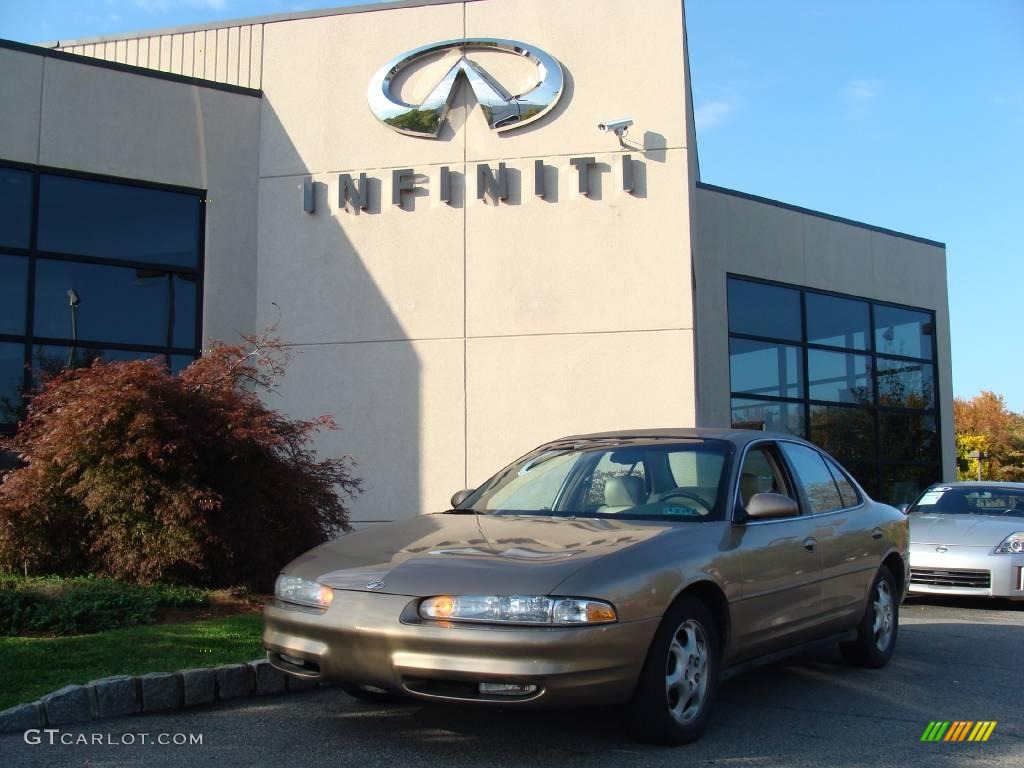 1998 Intrigue GL - Gold Metallic / Beige photo #1