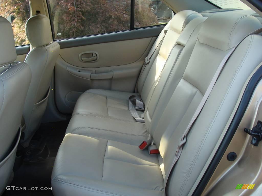1998 Intrigue GL - Gold Metallic / Beige photo #7