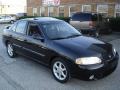 Blackout Black - Sentra SE Photo No. 4