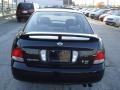 Blackout Black - Sentra SE Photo No. 6