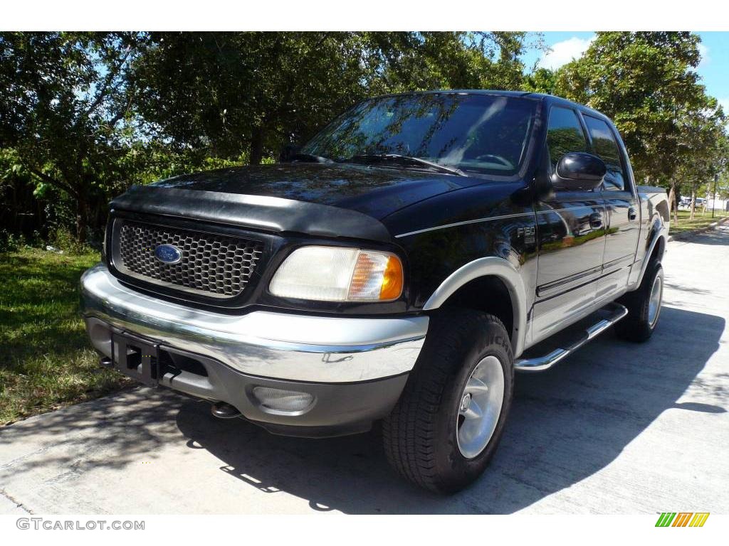2002 F150 Lariat SuperCrew 4x4 - Black / Medium Graphite photo #1