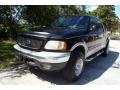 2002 Black Ford F150 Lariat SuperCrew 4x4  photo #1