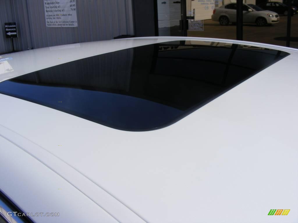 2009 Genesis 4.6 Sedan - White Satin Pearl / Black photo #14