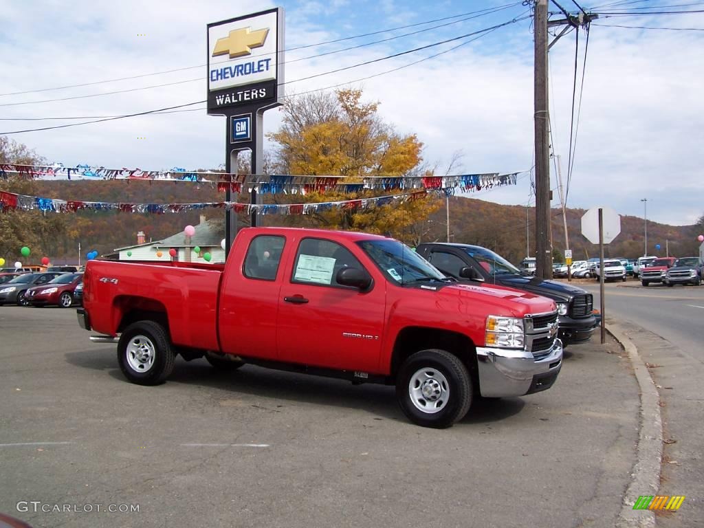 2009 Silverado 2500HD Work Truck Extended Cab 4x4 - Victory Red / Dark Titanium photo #1