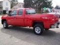 2009 Victory Red Chevrolet Silverado 2500HD Work Truck Extended Cab 4x4  photo #4