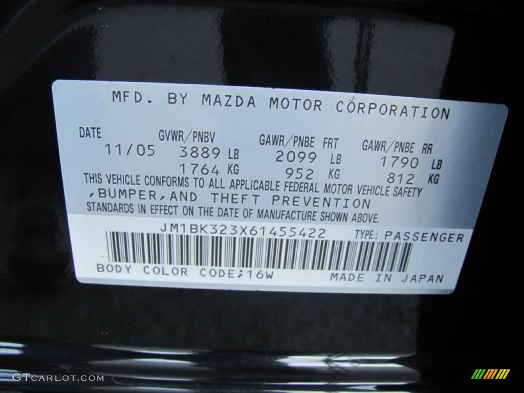 2006 MAZDA3 s Touring Sedan - Black Mica / Black/Red photo #14
