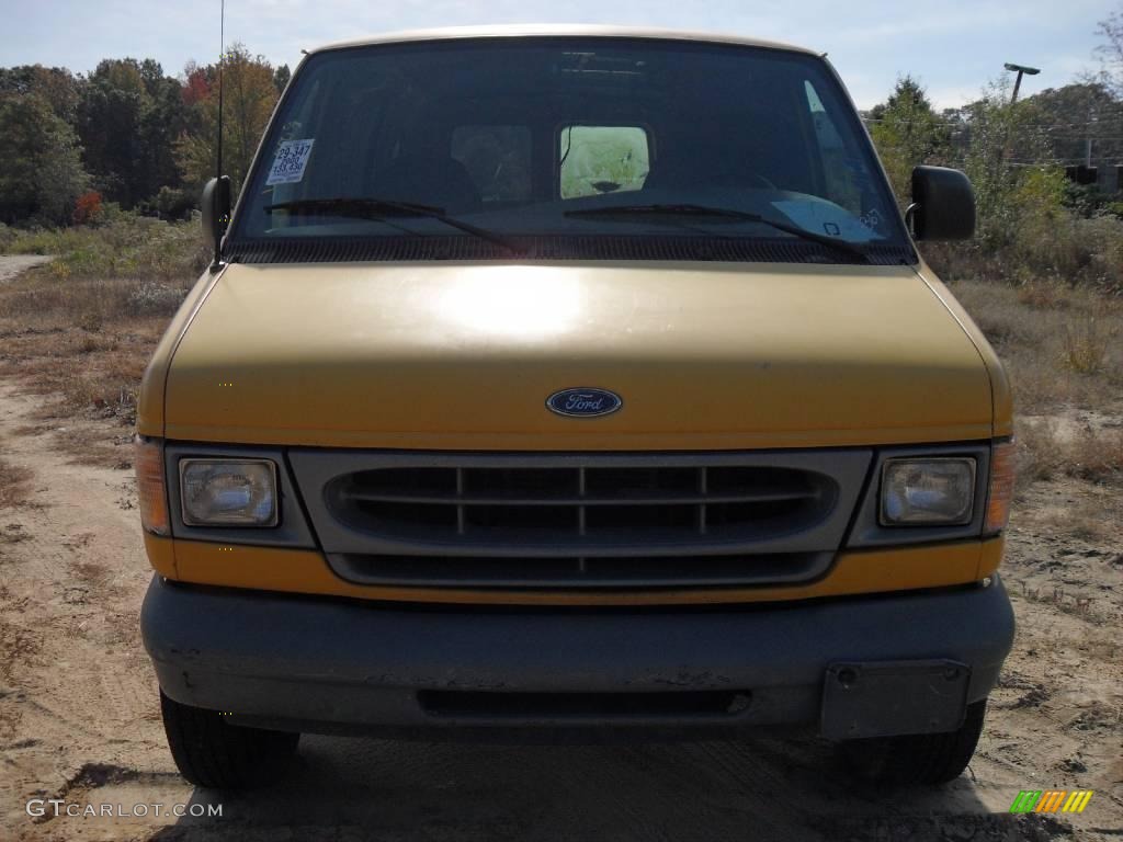 Yellow Ford E Series Van