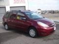 2009 Salsa Red Pearl Toyota Sienna LE  photo #3