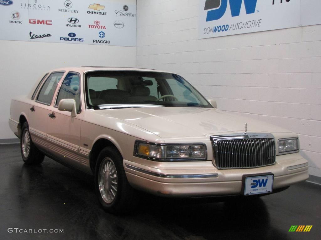 Ivory White Pearl Lincoln Town Car