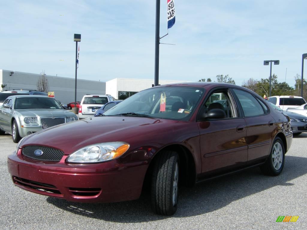 2006 Taurus SE - Merlot Metallic / Medium/Dark Flint Grey photo #1