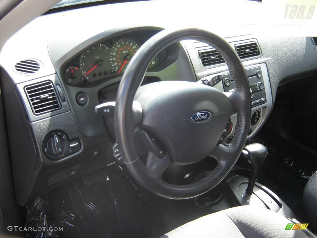 2005 Focus ZX5 SE Hatchback - Light Tundra Metallic / Charcoal/Charcoal photo #16