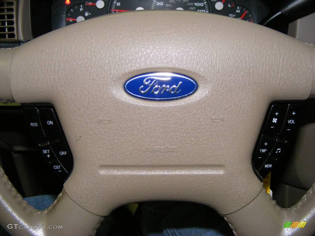 2004 Explorer Eddie Bauer 4x4 - Redfire Metallic / Medium Parchment photo #14