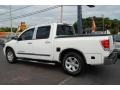 2005 White Nissan Titan LE Crew Cab  photo #2