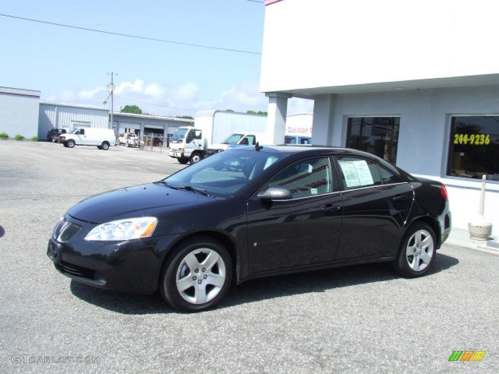 2009 G6 Sedan - Carbon Black Metallic / Ebony photo #1