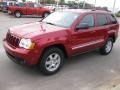 2010 Inferno Red Crystal Pearl Jeep Grand Cherokee Laredo  photo #1