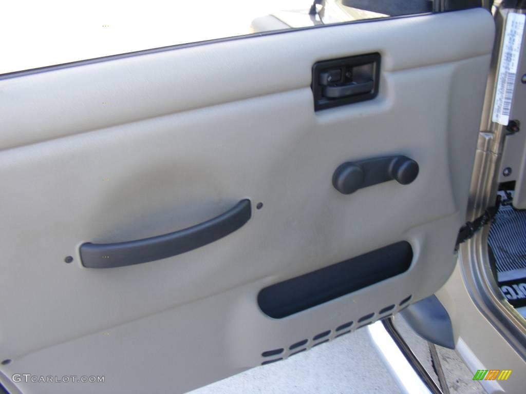 2004 Wrangler Sport 4x4 - Light Khaki Metallic / Khaki photo #29