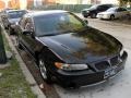 1998 Black Pontiac Grand Prix GT Sedan  photo #3