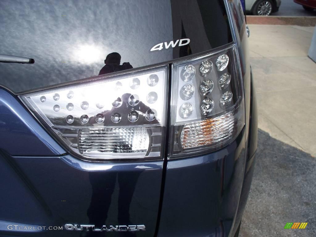 2009 Outlander SE 4WD - Deep Blue Metallic / Black photo #25
