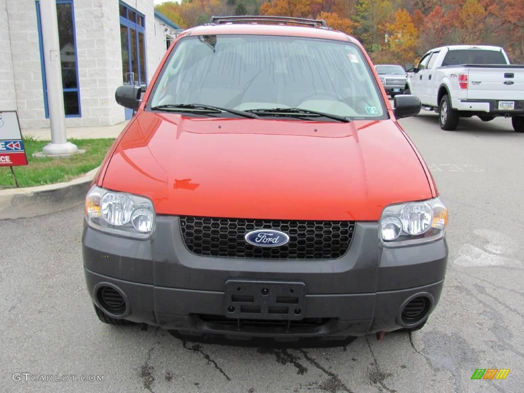 2006 Escape XLS 4WD - Blazing Copper Metallic / Medium/Dark Pebble photo #4