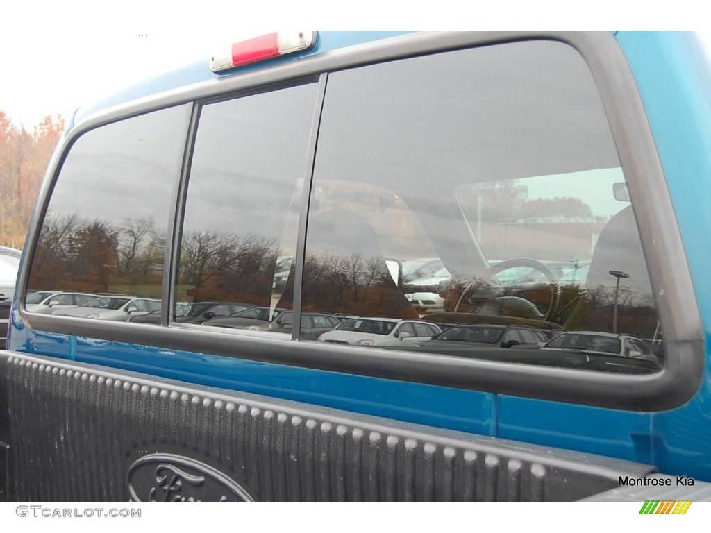 2000 F350 Super Duty XLT Extended Cab 4x4 Dually - Island Blue Metallic / Medium Graphite photo #58
