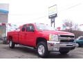2009 Victory Red Chevrolet Silverado 2500HD LT Extended Cab 4x4  photo #3