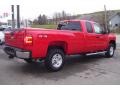 2009 Victory Red Chevrolet Silverado 2500HD LT Extended Cab 4x4  photo #5