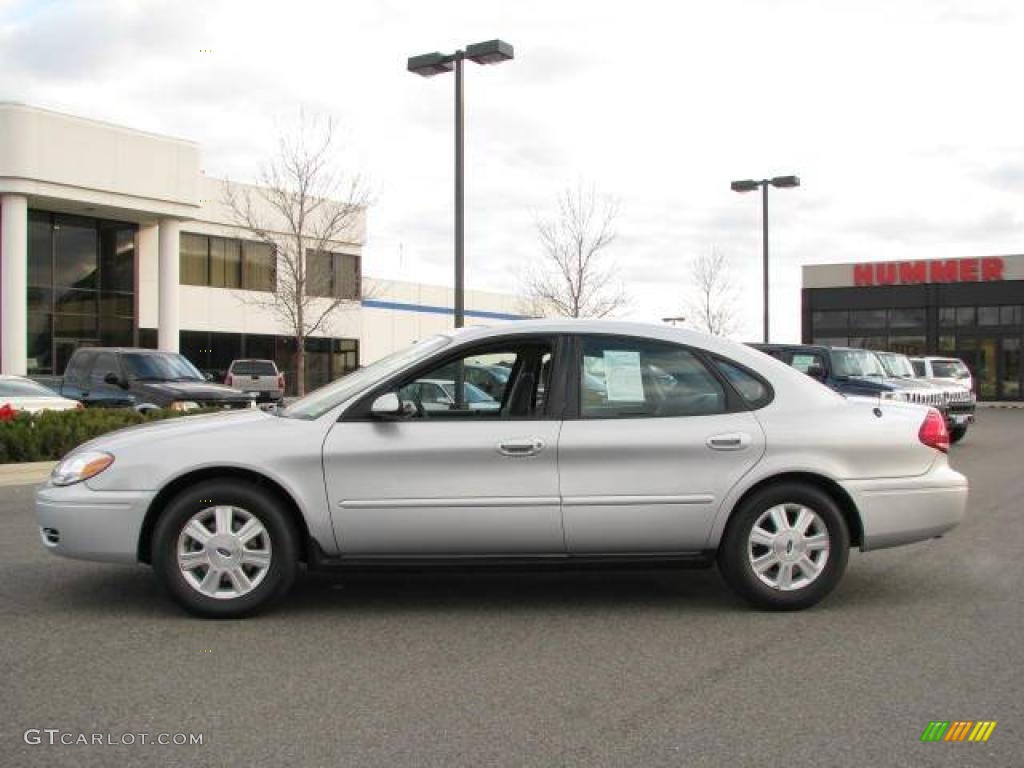 Silver Frost Metallic Ford Taurus