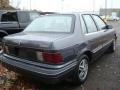 1987 Twilight Blue Metallic Plymouth Sundance   photo #2