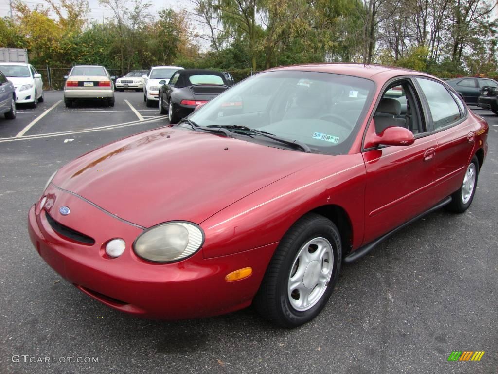 1997 Taurus GL - Toreador Red Metallic / Grey photo #1