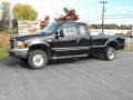 2000 Black Ford F250 Super Duty XLT Extended Cab 4x4  photo #1