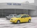 2005 Egg Yolk Yellow Ford Focus ZX5 SES Hatchback  photo #1