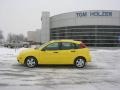 2005 Egg Yolk Yellow Ford Focus ZX5 SES Hatchback  photo #2