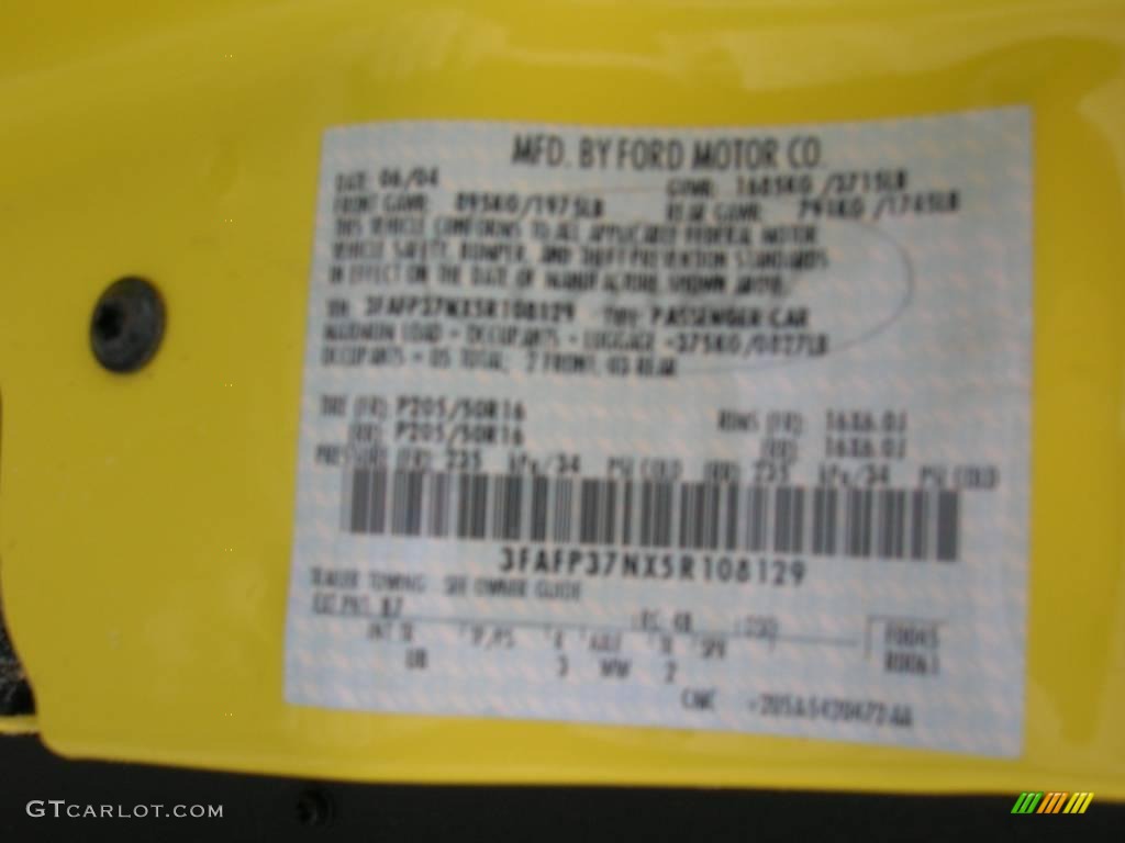 2005 Focus ZX5 SES Hatchback - Egg Yolk Yellow / Charcoal/Charcoal photo #12