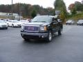 2008 Onyx Black GMC Sierra 1500 SLE Extended Cab 4x4  photo #24