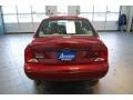 2000 Sangria Red Metallic Ford Focus SE Sedan  photo #4