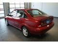 2000 Sangria Red Metallic Ford Focus SE Sedan  photo #5